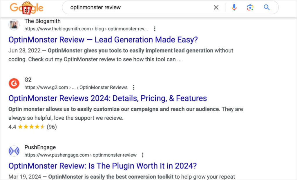 optinmonster-reviews-in-google-serp - OptinMonster A Google search for "optinmonster review." Search results include reviews fro The Blogsmith, PushEngage, and OptinMonster's G2 page.